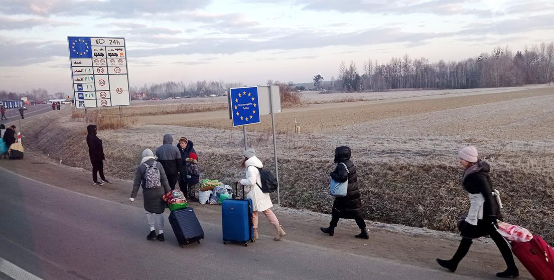 UNICEFUN0598207On 27 February 2022, people cross the border from Ukraine into Poland.jpg